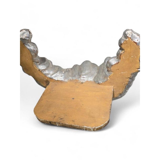 This beautiful 19th-century pedestal, intricately carved in the shape of a cloud and finished with a layer of silver leaf,...