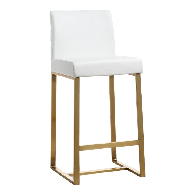 Furnish your kitchen or bar area in contemporary style with the Denmark counter stool. The gold solid stainless steel...