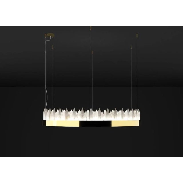 Urano shiny gold 120 pendant light 3 by alabastro italiano dimensions: ø 120 x h 20 cm. Materials: glass and shiny gold...