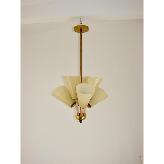 Chandelier in Brass and Glass, Kamenický Šenov, Czechoslovakia, 1950s, in Good conditions. Designed 1950 to 1959 Up to...