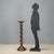 Walnut pedestal plant stand from the late 19th century, originating from Italy, featuring an elegant and functional...