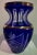 Bohemian carved glass vase in blue and golden tonality. This piece is attributed to the mentioned designer/maker. It has...
