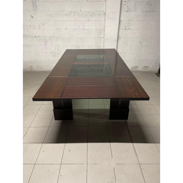 Extendable 70s dining table. Standing structure with central crystal inserts that make the aesthetic of this lighter...