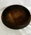 A generously proportioned antique wooden treen bowl, likely British and dating to the 19th century. Turned from a single...