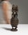 This 20th century African hand-carved lidded vessel with caryatid figures from Africa is carved in dark wood as a lidded...
