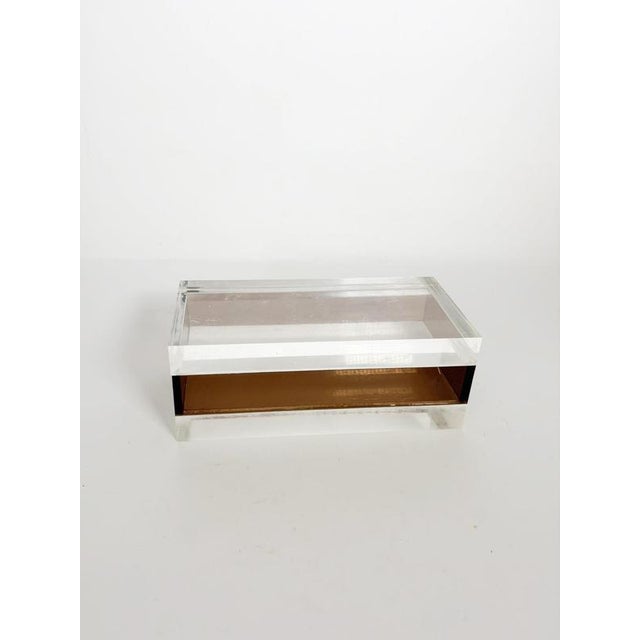 Elegant French storage box crafted in clear Altuglas (acrylic) with a smoked brown central section, embodying the clean...