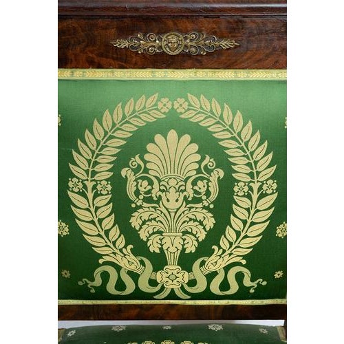 Antique mahogany feather-upholstered armchair, finely carved, 19th century. General Condition: Excellent condition....