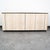 Faux stone 1980s credenza with drawer and cabinet storage within. Unknown maker.