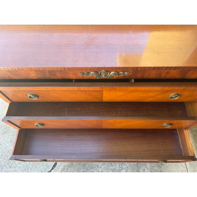 Antique French Empire style Mahogany chest of drawers with ornate brass hardware. Excellent condition. No damages. Clean...