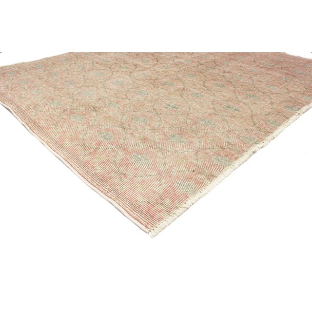 51984 Distressed Vintage Turkish Sivas Rug, 04'05 x 05'02. Step into a world of quiet sophistication with this hand-...