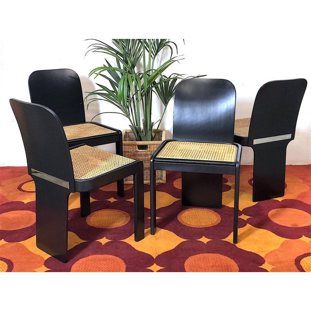 Set of 4 vintage 1970s chairs, the chairs were designed by Pier Luigi Molinari and produced by wells in the 70s....