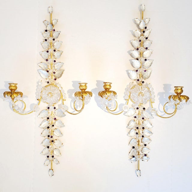 A pair Bagues style decorative wall candle holders with Rock Crystal. They feature a beautiful foliage motif with gold...