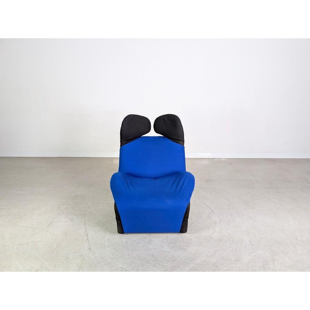 Beautiful Cassina Wink Chair in black fabric with a blue cover for sale. This chair is considered a true design classic...