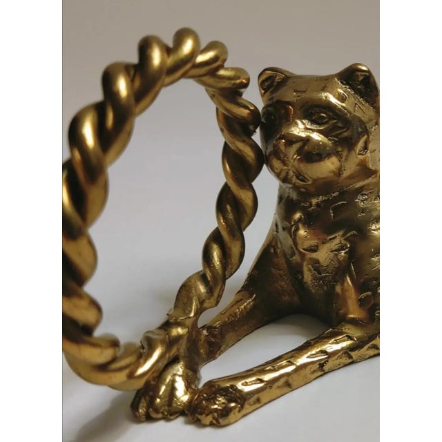 For your consideration. . . An exquisite rare vintage set of ornate gleaming brass Jaguar napkin ring holders. These...