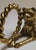 For your consideration. . . An exquisite rare vintage set of ornate gleaming brass Jaguar napkin ring holders. These...