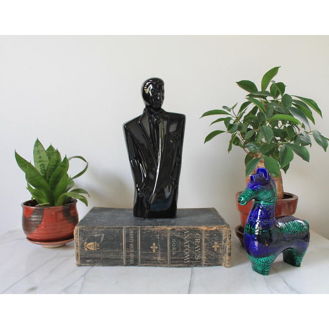 Vintage postmodern style black ceramic male figure. Minor age wear.