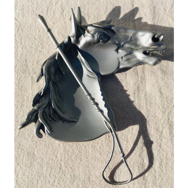 This is a mid century equestrian trinket bowl. This small bowl comes with a detachable riding crop. The Equestrian bowl is...