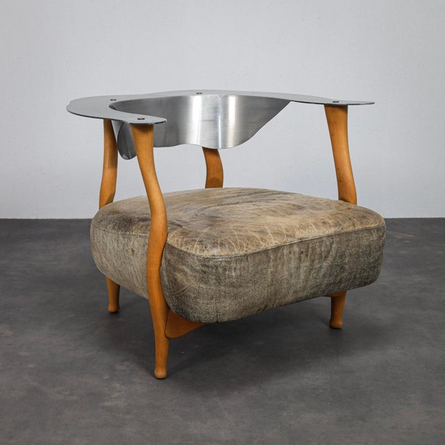 The fantasy island lounge chair by kurt bayer embodies the expressive material contrasts characteristic of 1980s...