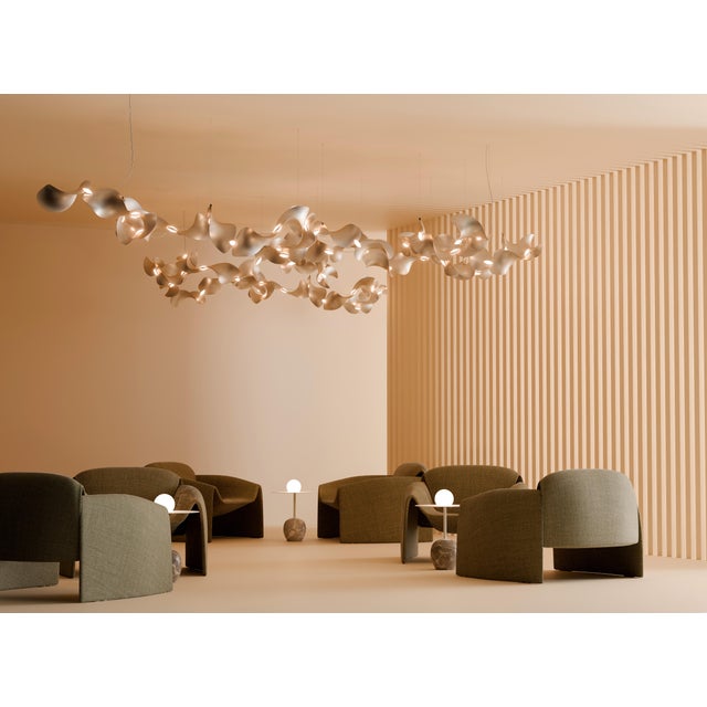 The wide, undulating curves of large sand dunes inspired us to create the modular Dune light fixture. Fascinated by the...