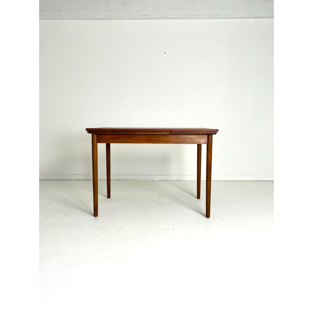 Extendable Teak Dining Table, Small Size, Denmark, 1960s A rare, slightly smaller Danish extendable dining table from the...