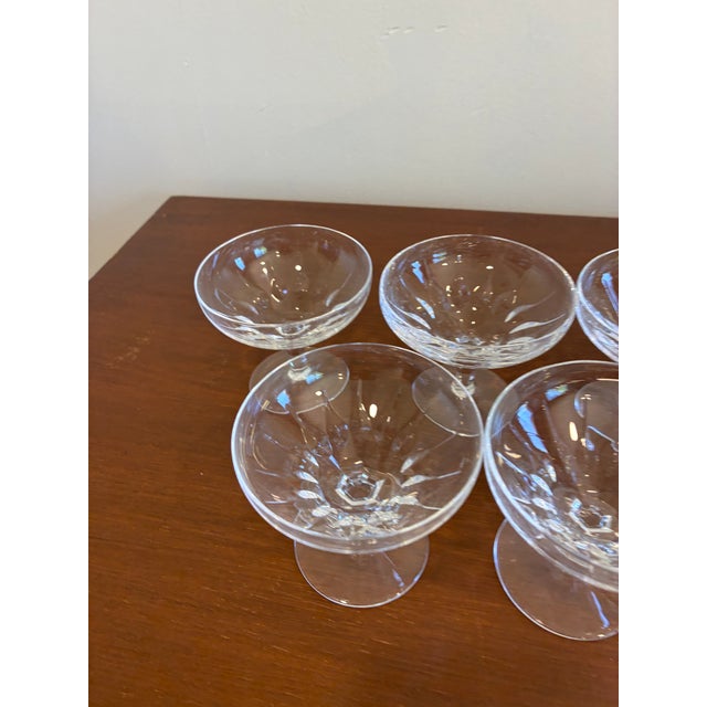 A charming set of seven vintage Josair crystal oyster dishes featuring an elegant footed form and subtle cut crystal...
