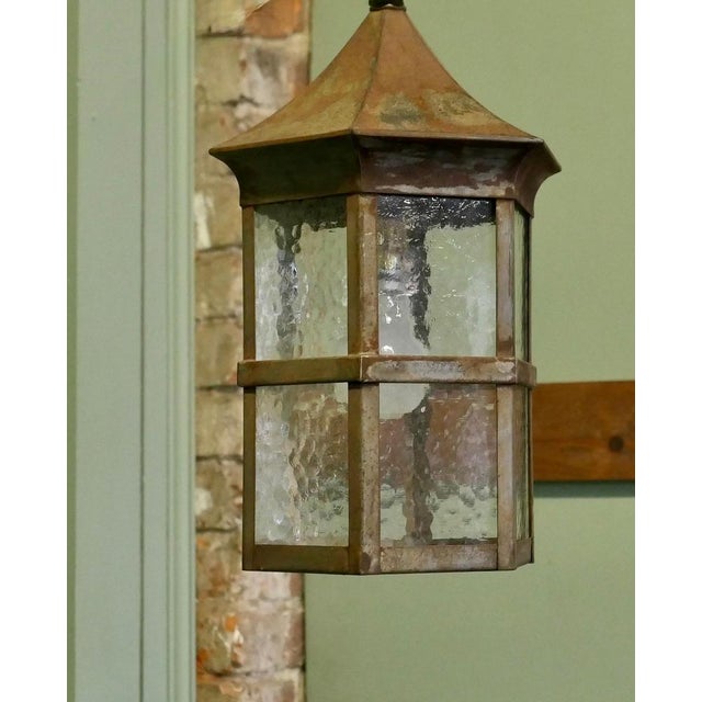 Classical Iron Hanging Lantern This is a very attractive traditional Lantern it has pebble glazed sides which are divided...