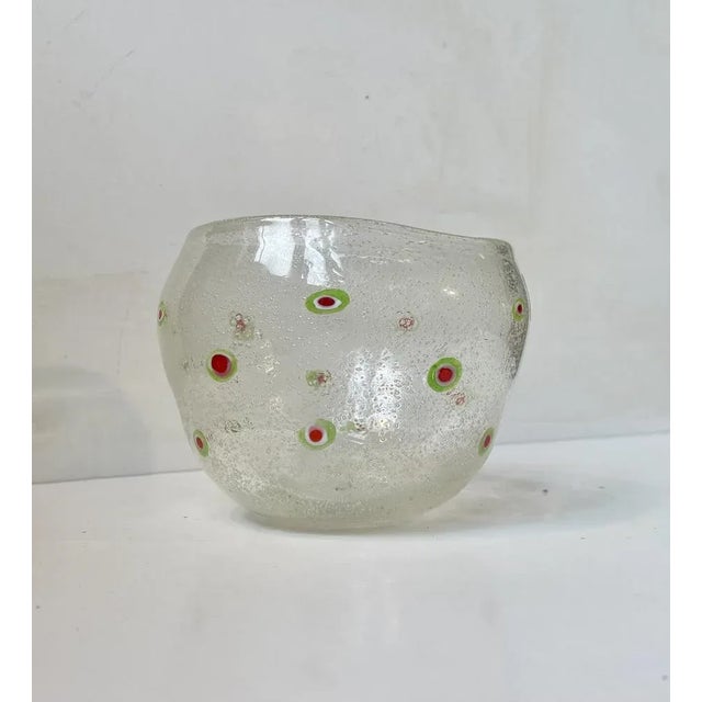Hand blown organically shaped free-form bowl in Murano bubble glass. Decorated with flowers in Italian tri-color: red,...