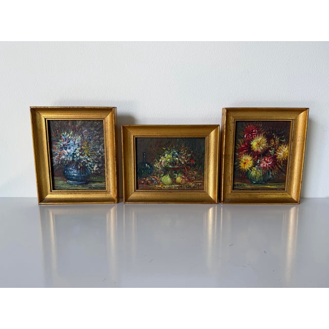 A vibrant set of three 1980s still life oil paintings on masonite, each showcasing expressive, heavy brushwork and rich,...