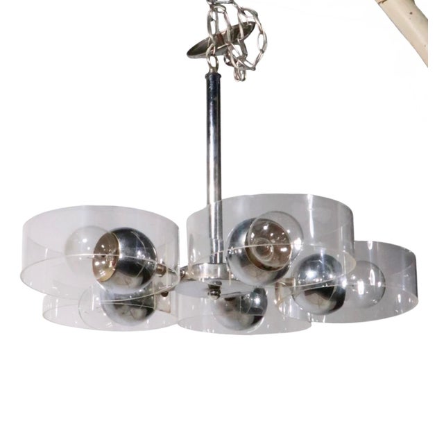 Space Age, Mid Century chandelier, having five chrome arms, each with a ball form socket, surrounded by a clear plexi -...