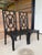 A striking pair of dining side chairs by Guildmaster featuring tall geometric Chinoiserie-style backs and inset woven cane...