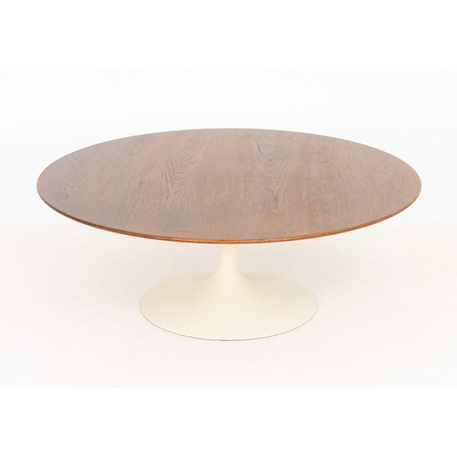 Eero Saarinen for Knoll Associates Tulip Coffee Table, with circular oak top above white enameled pedestal base, Knoll...