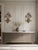 Truly enchanting pair of highly decorative wall sconces, crafted in the elegant spirit of the Italian Florentine style....