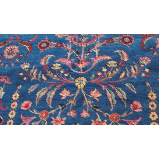 Antique Persian Laver Kerman carpet, amazing color in excellent condition with unique blue background. Kirman was a very...