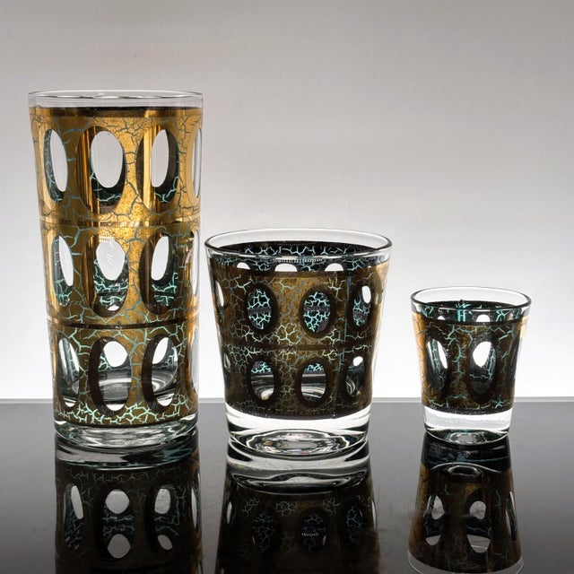 An exceptional and complete 12-piece Culver “Pisa” barware service, dating to the early 1960s. This coveted mid-century...