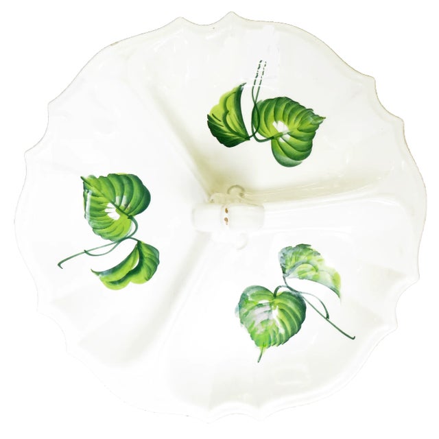 Lovely green and white divided serving plate with handle. Ivy motif with scalloped edges and circular handle in the...