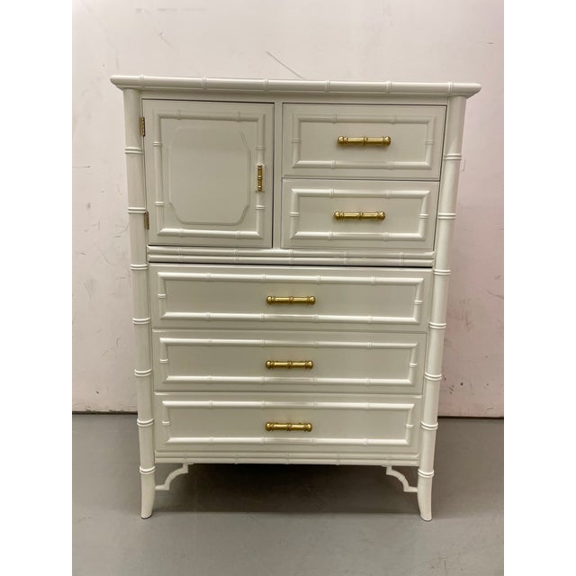Dixie Aloha Tallboy Chest of Drawers Dimensions: H49” x W36” x D19” This elegant Dixie Aloha tallboy chest embodies...