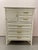Dixie Aloha Tallboy Chest of Drawers Dimensions: H49” x W36” x D19” This elegant Dixie Aloha tallboy chest embodies...