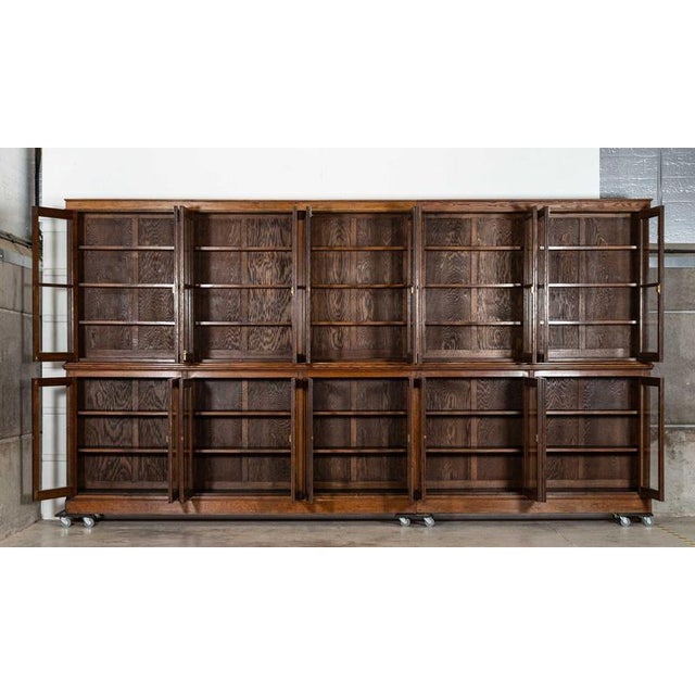 Circa 1890 monumental 19thc oak glazed library bookcase together w492 x d37 x h263 cm base w492 x d37 x h125 cm base...