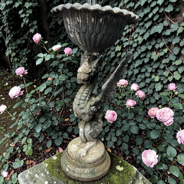 Unique set of monumental griffin garden statues / bird baths Beautiful and rare set of two large garden statues in the...