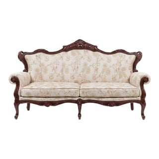 1980s Victorian Revival Sofa and Accent Chair, Ornate Carved Mahogany Frame, Floral Upholstery For Sale