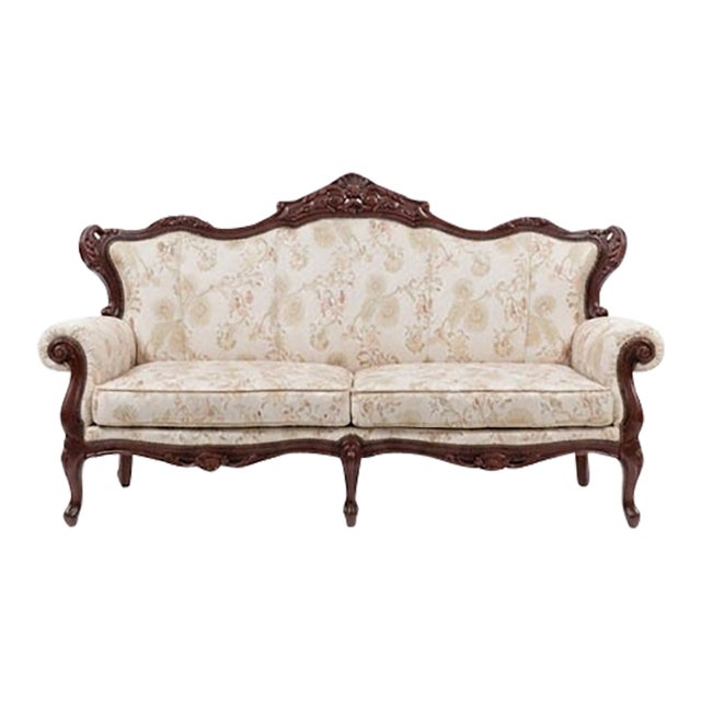 1980s Victorian Revival Sofa and Accent Chair, Ornate Carved Mahogany Frame, Floral Upholstery For Sale
