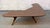 This is a vintage mid-century modern boomerang atomic coffee table featuring a distinctive two-tier wood-grain design and...