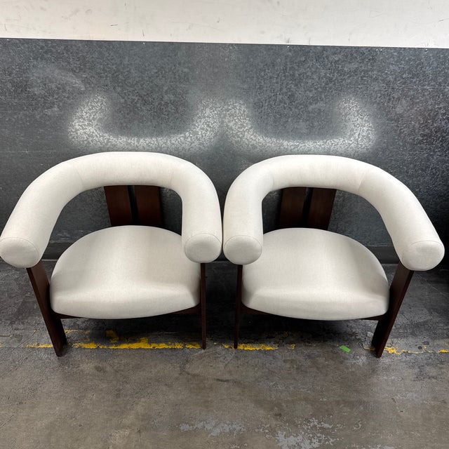 Design Plus Gallery presents a Pair of Tola Lounge Chairs from Rove Concepts, manufactured by Kaye. The contemporary...