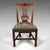 This is an antique embroidered side chair. An English, mahogany hall or morning room seat in the manner of Chippendale,...