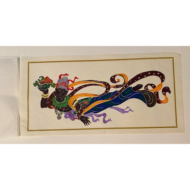 Chinese cut out of a deity made of painted and cut thin paper. The cut out come with between tissue paper and a backing...