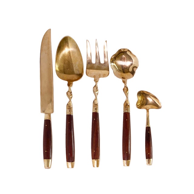 43 piece Vintage Rosewood and brass flatware set. Made in Thailand in the 60's. Includes Serving utensils and a setting...