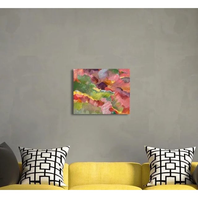 Reds, greens, yellows in diagonal waves from lower right to upper left; reminiscent of mountain ranges and tectonic plates.