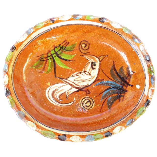 Trio of colorful Tlaquepaque Mexican redware serving pieces. Artisan crafted piece of terracotta, red clay formed by hand...