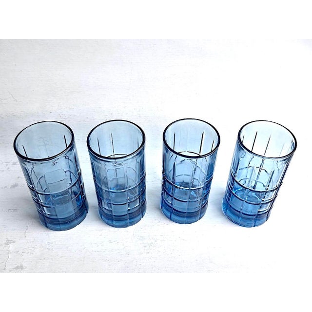 Offered is a set of 4 heavy Anchor Hocking Flat Iced Tea glasses in their 1960s Tartan pattern in the color Blueberry. The...