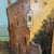 A Impasto oil on canvas painting depicts a Venetian setting executed in vibrant hues, signed on the lower corner...